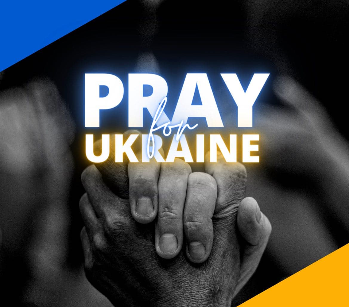Pray for Ukraine — hands clasped in prayer